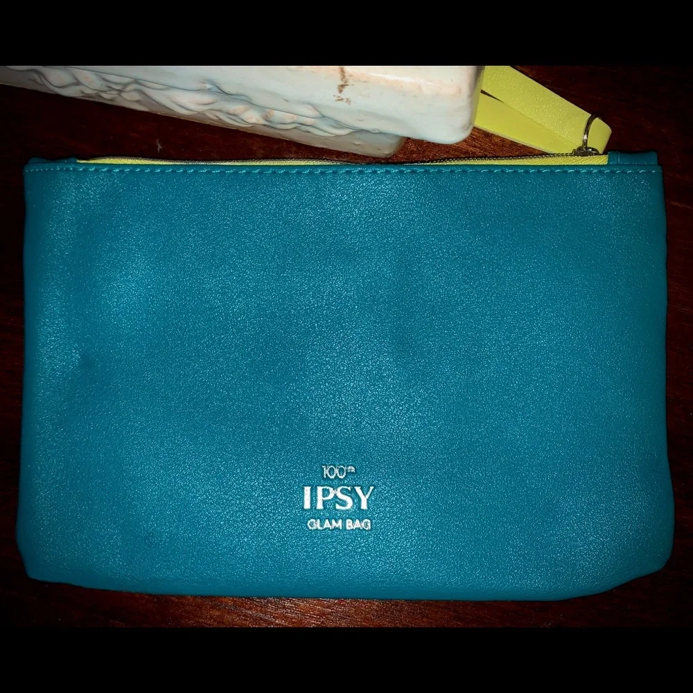 NWOT Turquoise make up bag with gold studs yellow trim IPSY